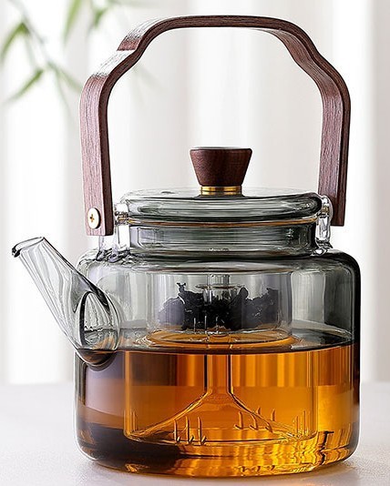 قوری خاکستری شیشه ای را می توان به طور مستقیم در اجاق گاز برقی گرم کرد تا قوری را با پرتو چای گل بپزید